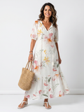 Noa | Vestido midi floral de volantes con borlas