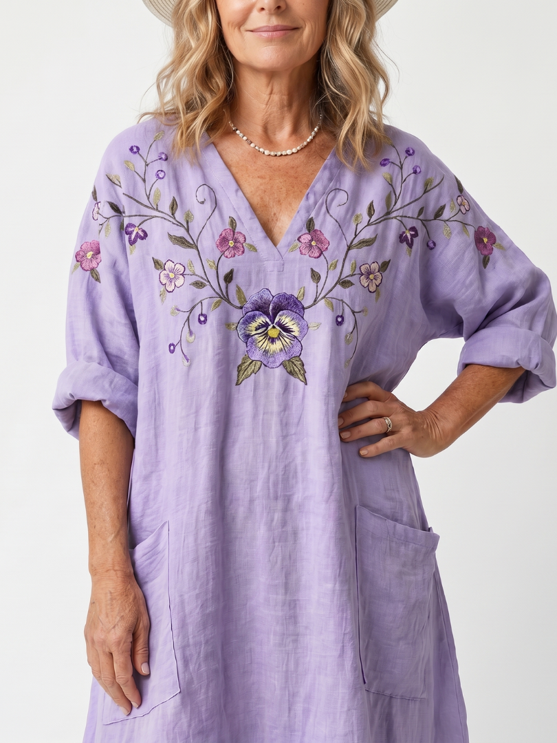 Tavi | Vestido midi oversize con bordado floral y bolsillos