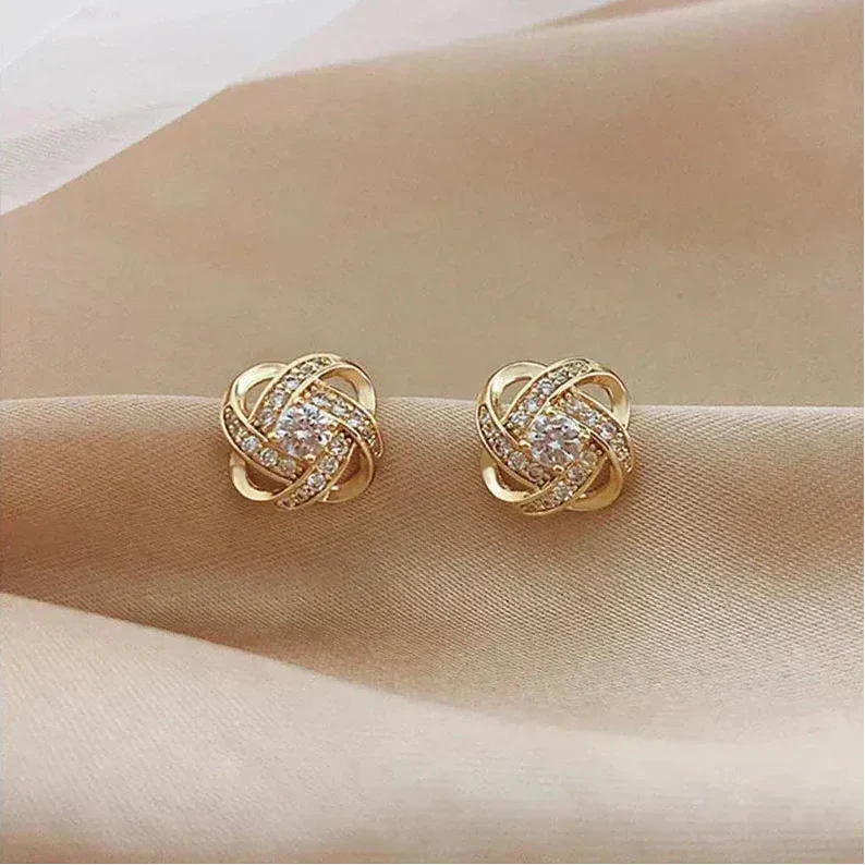 Lourdes - Pendientes Dorados de Espiral con Cristales