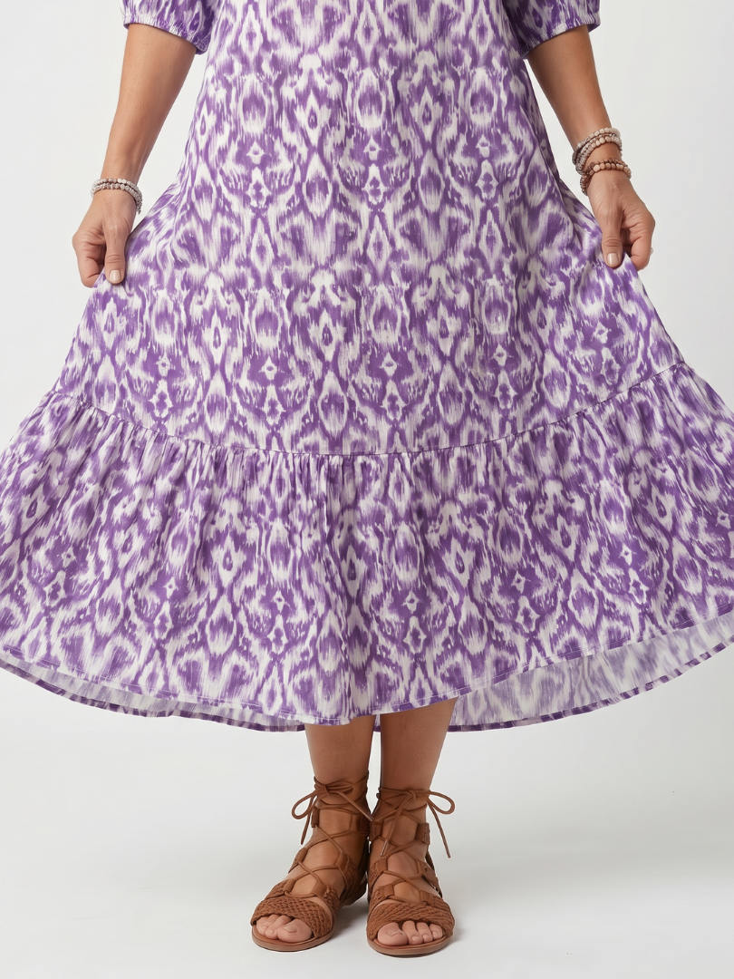 Penelope | Vestido midi estampado con cordón de borlas
