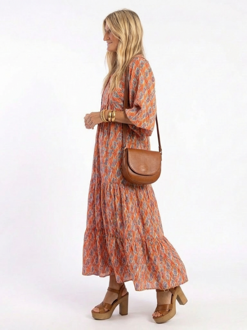 Amara | Vestido midi de volantes con estampado geométrico y escote en V