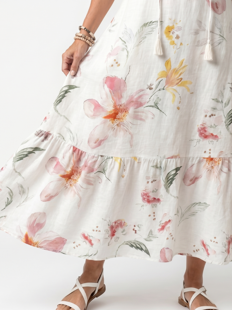 Noa | Vestido midi floral de volantes con borlas