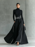 Gina – Vestido Maxi de Mujer Negro con Costuras Blancas y Cuello Alto, Manga Larga, Cintura Entallada