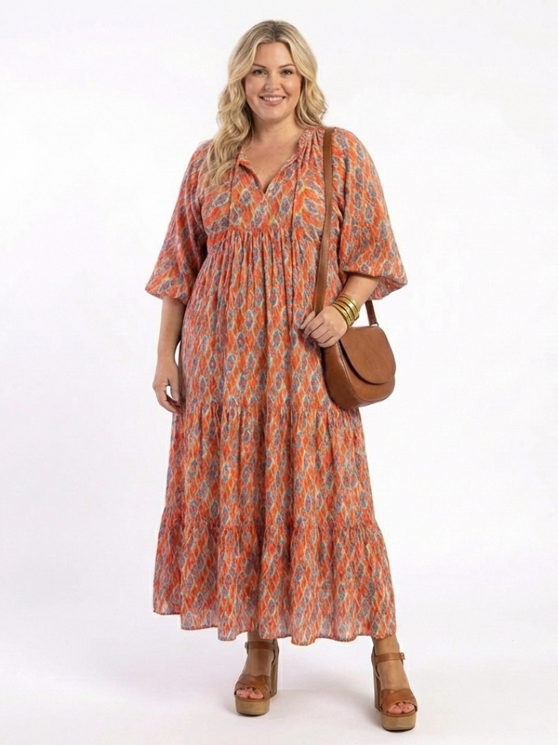 Amara | Vestido midi de volantes con estampado geométrico y escote en V
