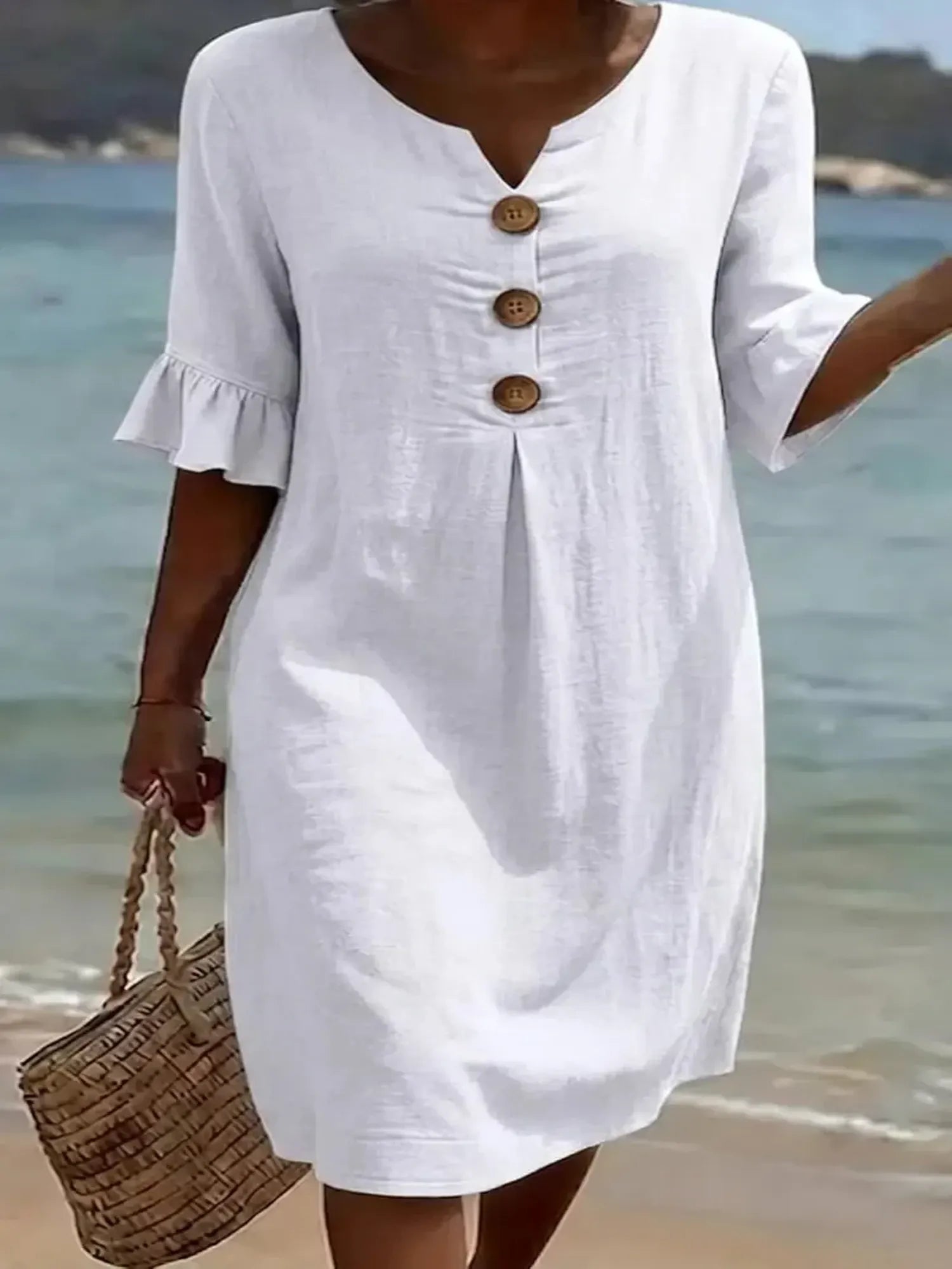 Vanesa™ | Vestido texturizado con mangas abullonadas y botones