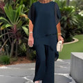 Conjunto compuesto por un top irregular fascinante y pantalones de pierna ancha