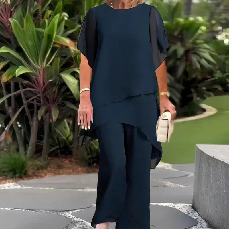 Conjunto compuesto por un top irregular fascinante y pantalones de pierna ancha