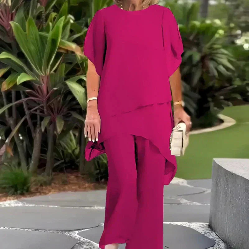 Conjunto compuesto por un top irregular fascinante y pantalones de pierna ancha